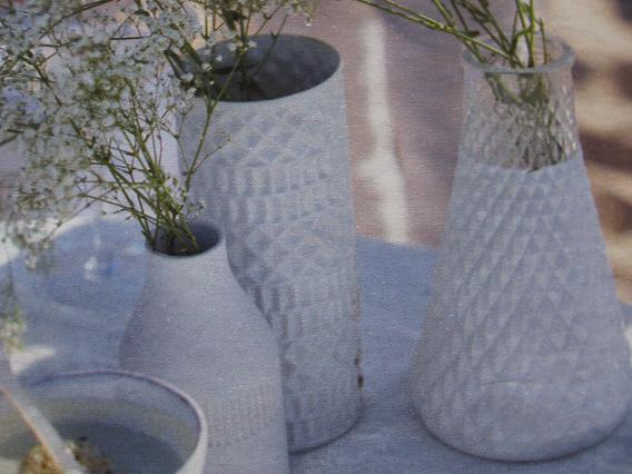 Oude glazen vaasjes nieuwe look geven